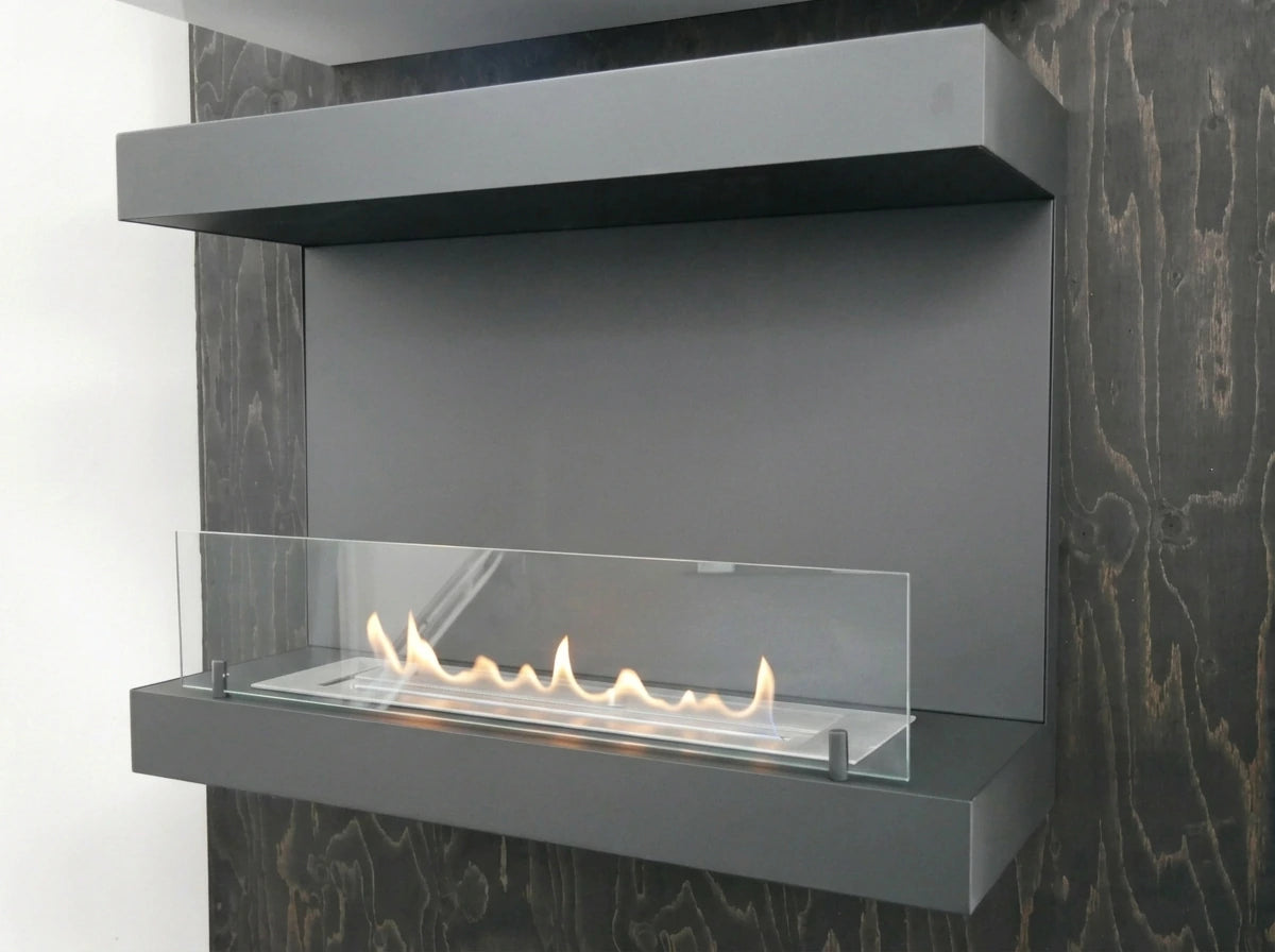 Dakota black three-sided bio fireplace mounted on a dark wood-panelled wall, lit flame