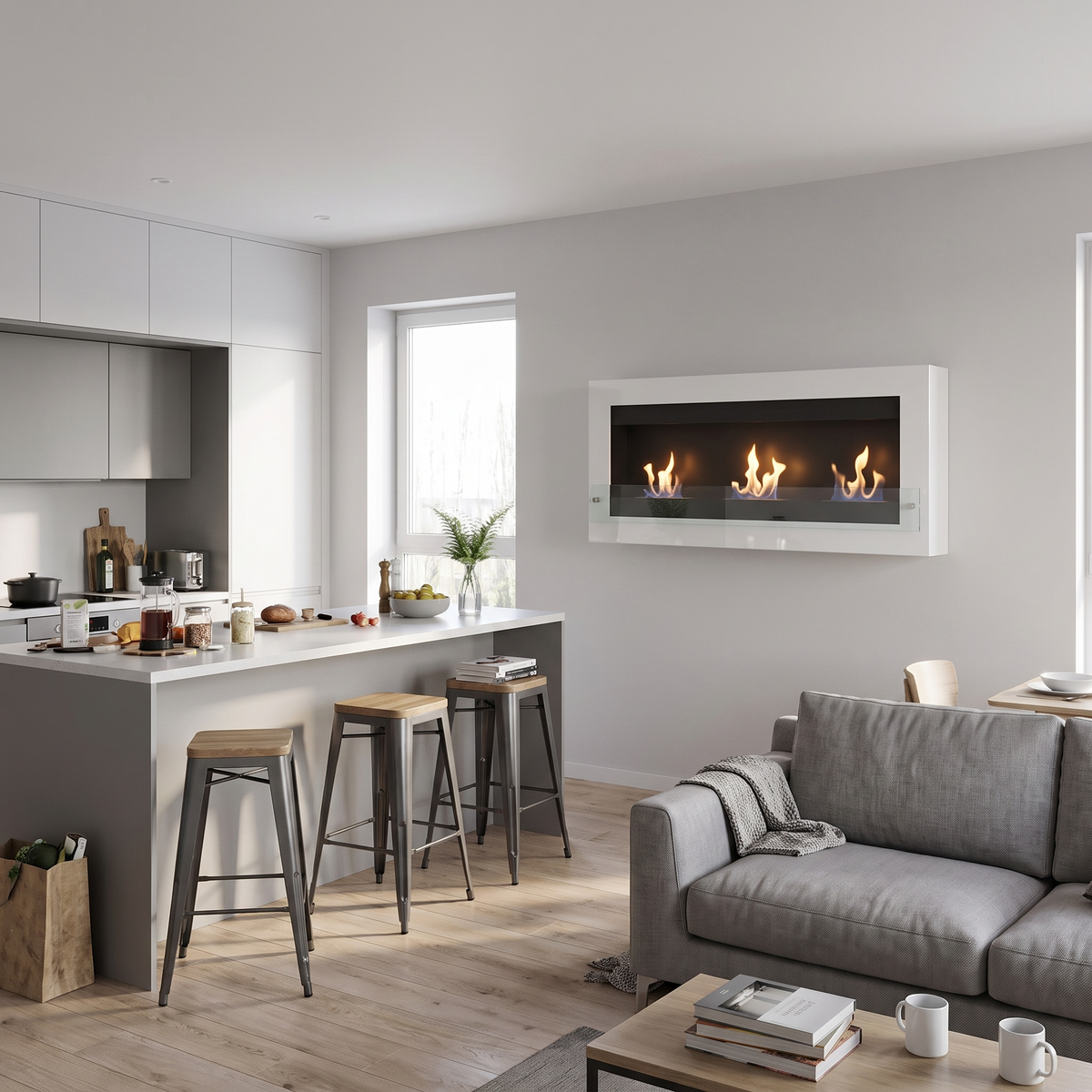 XL wall-mounted white bioethanol fireplace with lit flames, styled between a kitchen island and grey sofa in an open-plan kitchen-living room